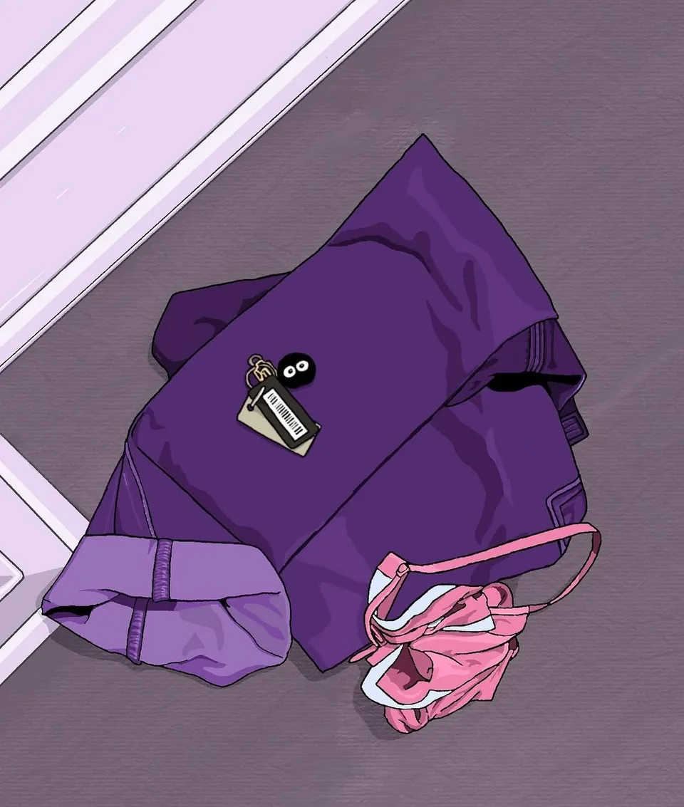 Looking down at a purple hooded sweatshirt and a pink garment dropped on a lilac floor, a small bee resting on the fabric.